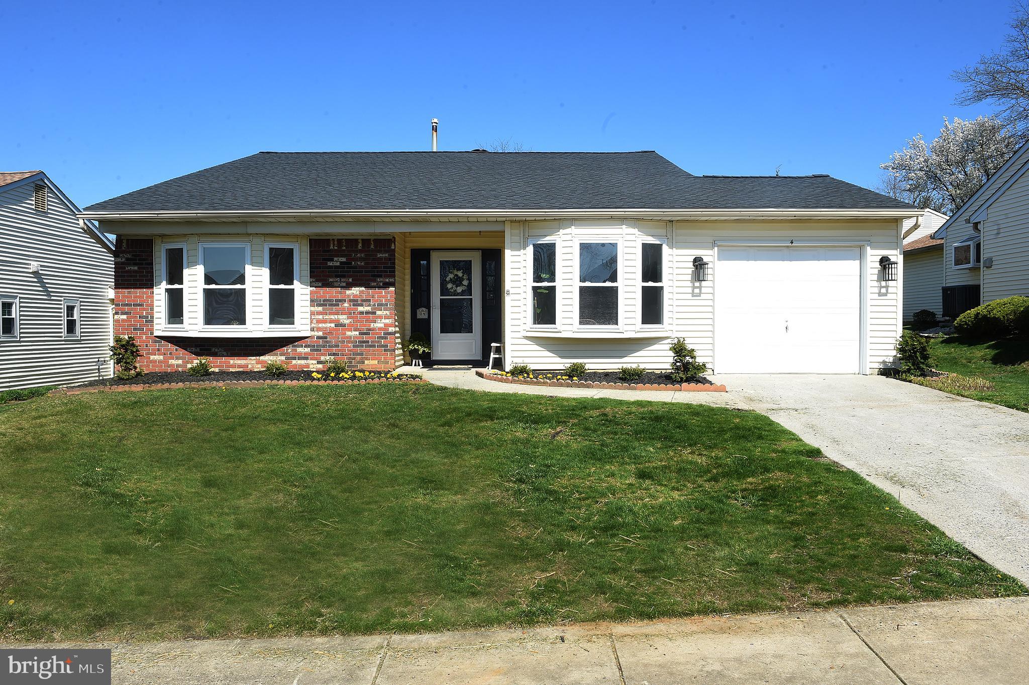 4 Deep Hollow Lane North Columbus, NJ 08022 - Photo 27 of 27 a front view of a house with a yard
