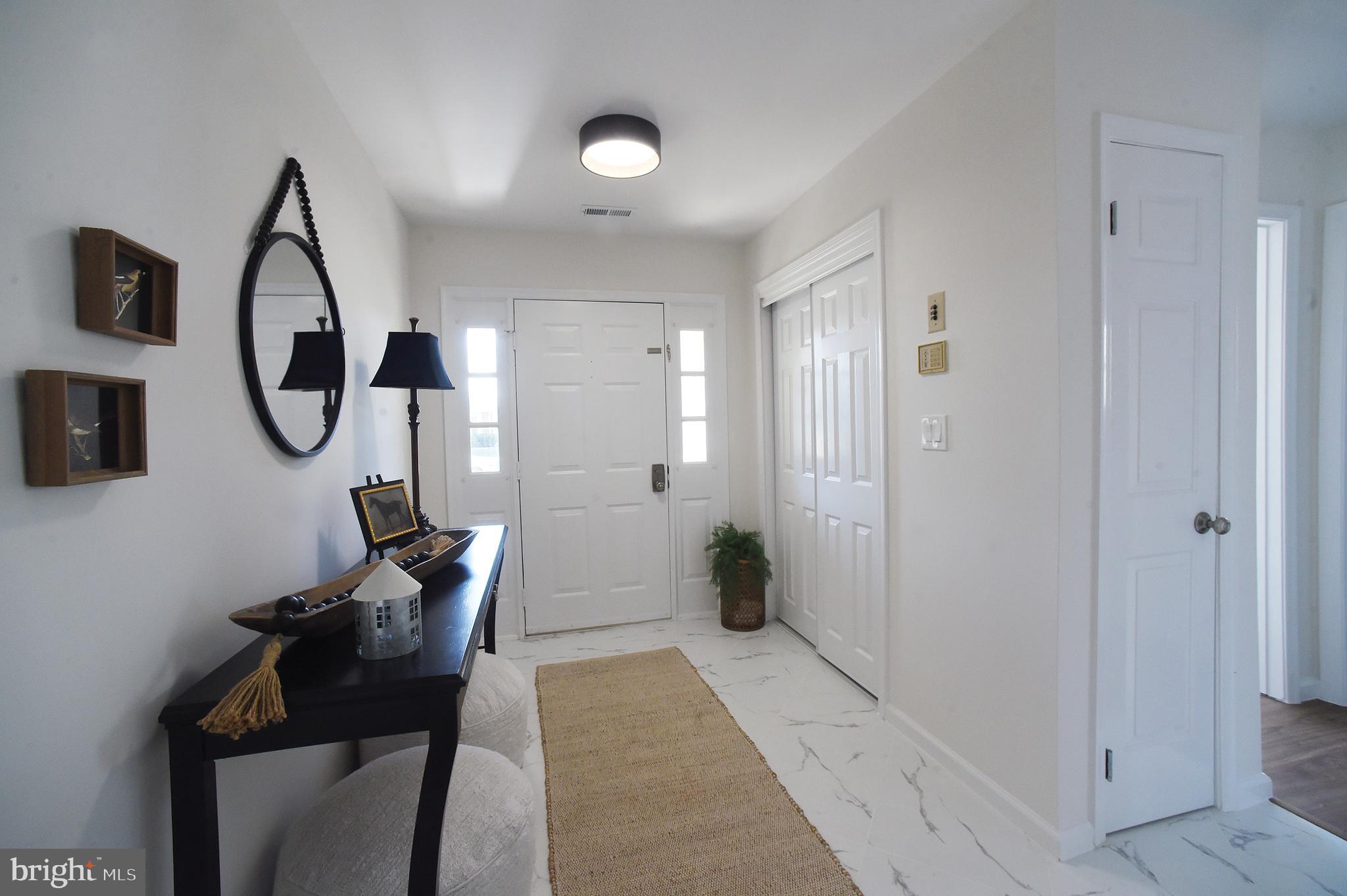 4 Deep Hollow Lane North Columbus, NJ 08022 - Photo 4 of 27 a view of a hallway with seating area