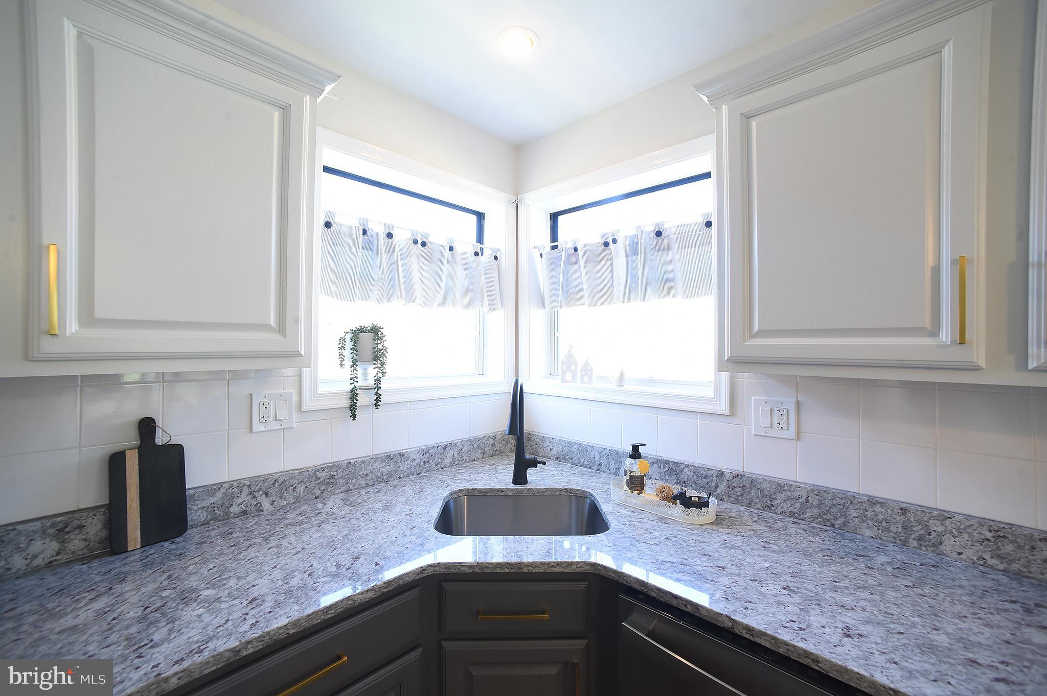4 Deep Hollow Lane North Columbus, NJ 08022 - Photo 7 of 27 a kitchen with a sink and a window