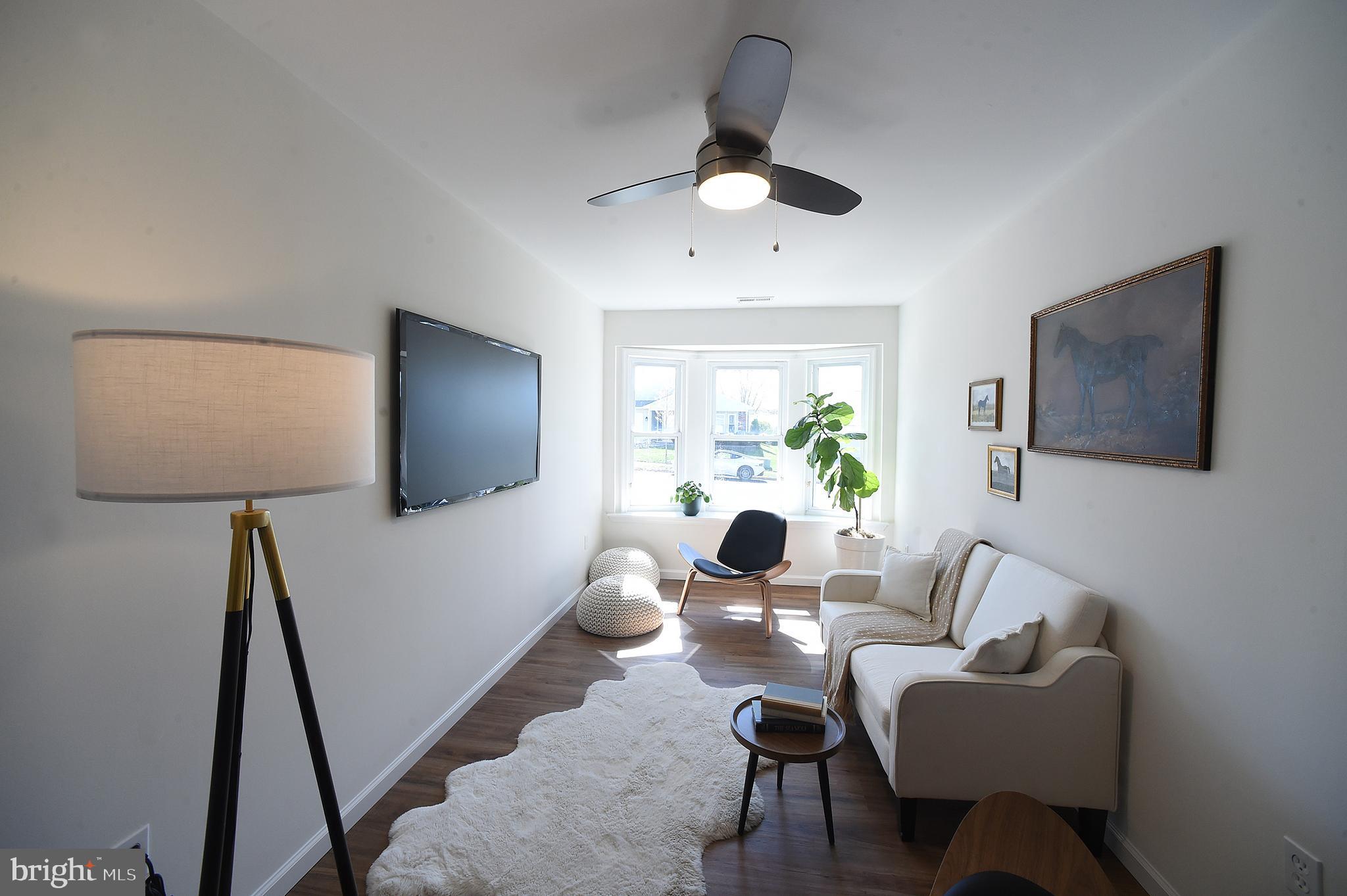 4 Deep Hollow Lane North Columbus, NJ 08022 - Photo 10 of 27 a living room with furniture and a flat screen tv