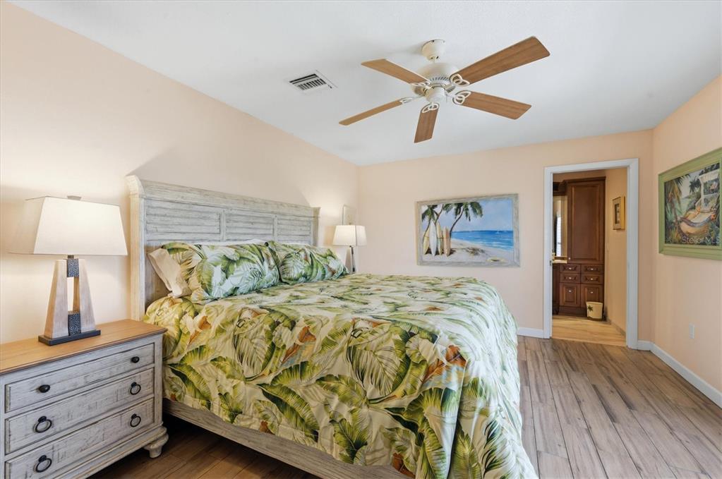 2729 North Beach Road, Unit 211 Englewood, FL 34223 - Photo 24 of 51 a bed room with a bed and a window