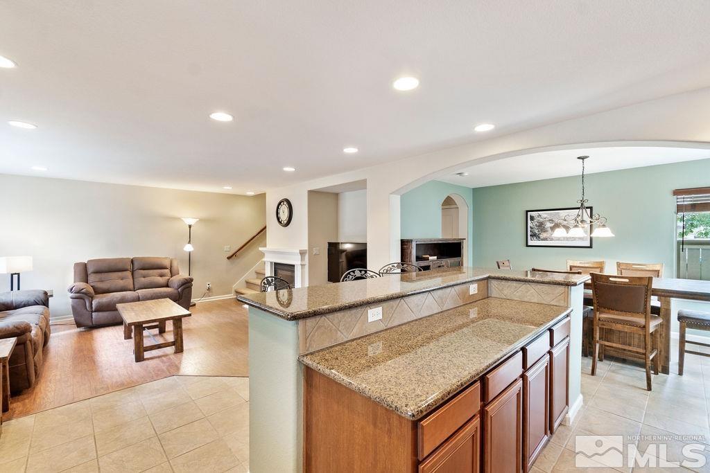 7686 Pebblestone Way Reno, NV 89523 - Photo 16 of 35 a view of a living room and dining room