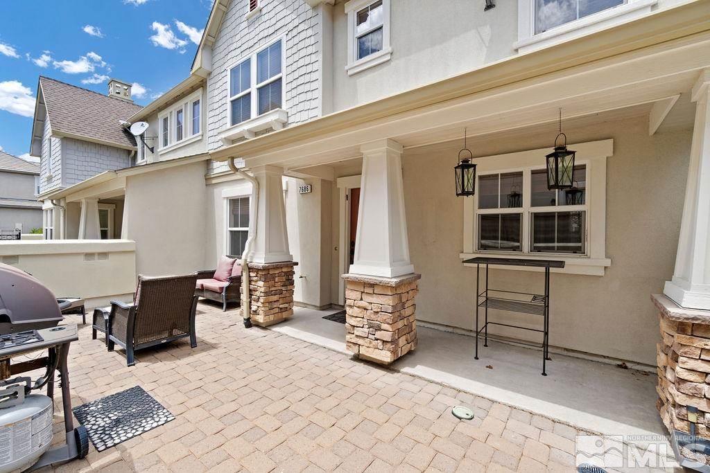 7686 Pebblestone Way Reno, NV 89523 - Photo 4 of 35 a view of a building with couch