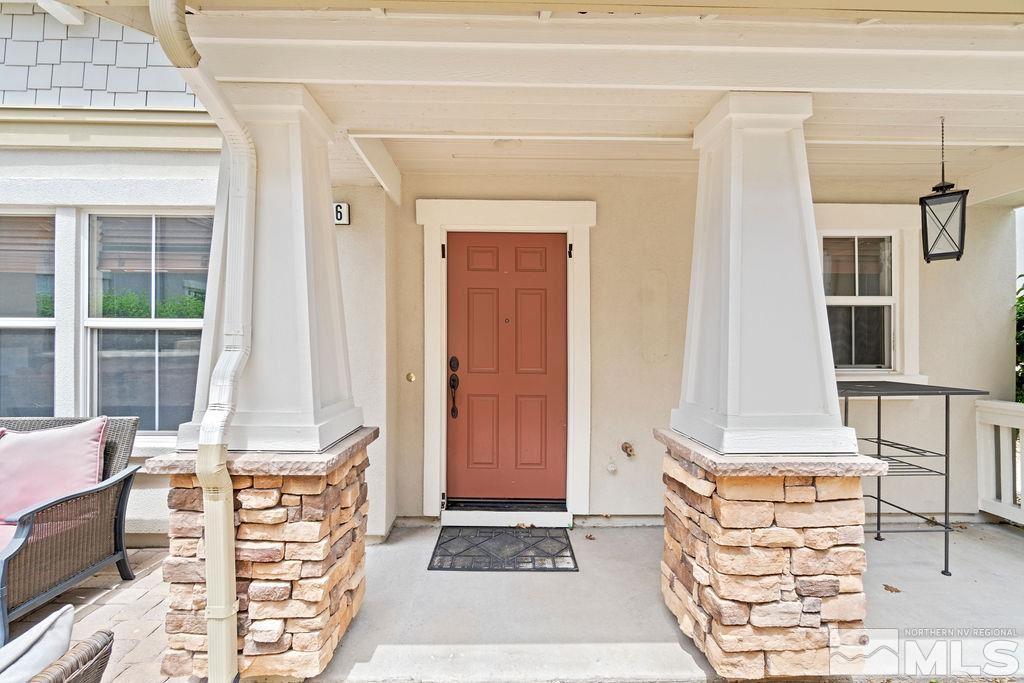 7686 Pebblestone Way Reno, NV 89523 - Photo 6 of 35 a front view of a house with outdoor