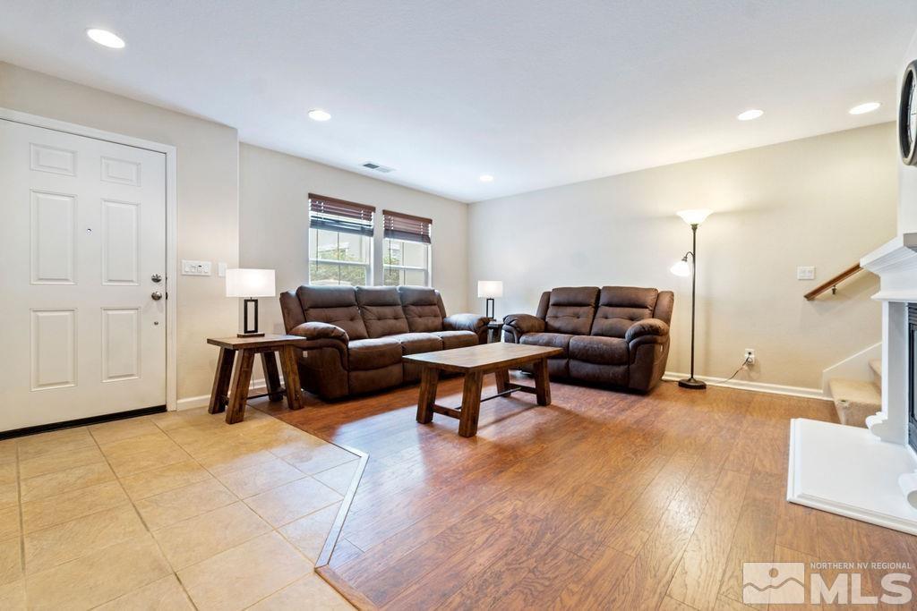 7686 Pebblestone Way Reno, NV 89523 - Photo 8 of 35 a living room with furniture and a window