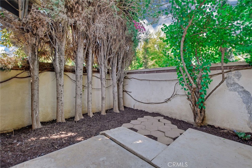 9505 Arlington Avenue, Unit 89 Riverside, CA 92503 - Photo 21 of 26 a view of a backyard