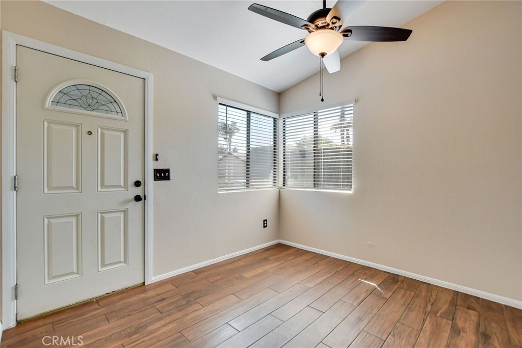 9505 Arlington Avenue, Unit 89 Riverside, CA 92503 - Photo 5 of 26 a view of empty room with wooden floor and fan