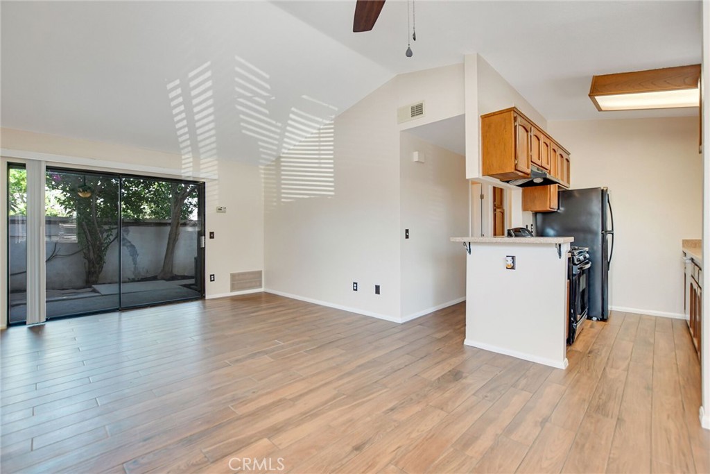 9505 Arlington Avenue, Unit 89 Riverside, CA 92503 - Photo 8 of 26 an entryway with wooden floor and windows