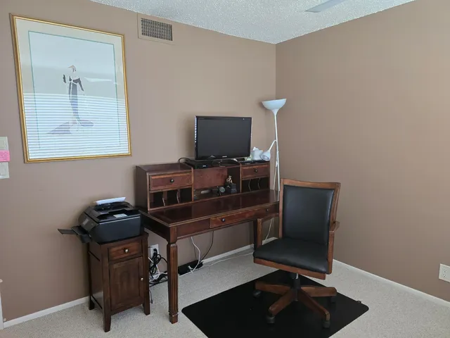 a room with furniture and wooden floor