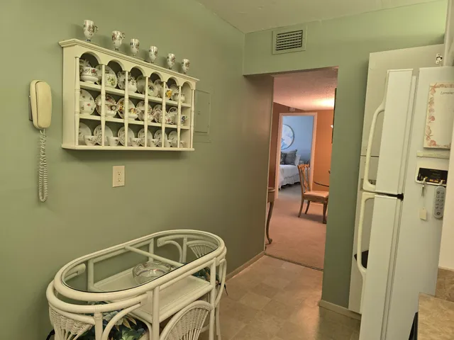 a bathroom with a tub and a sink