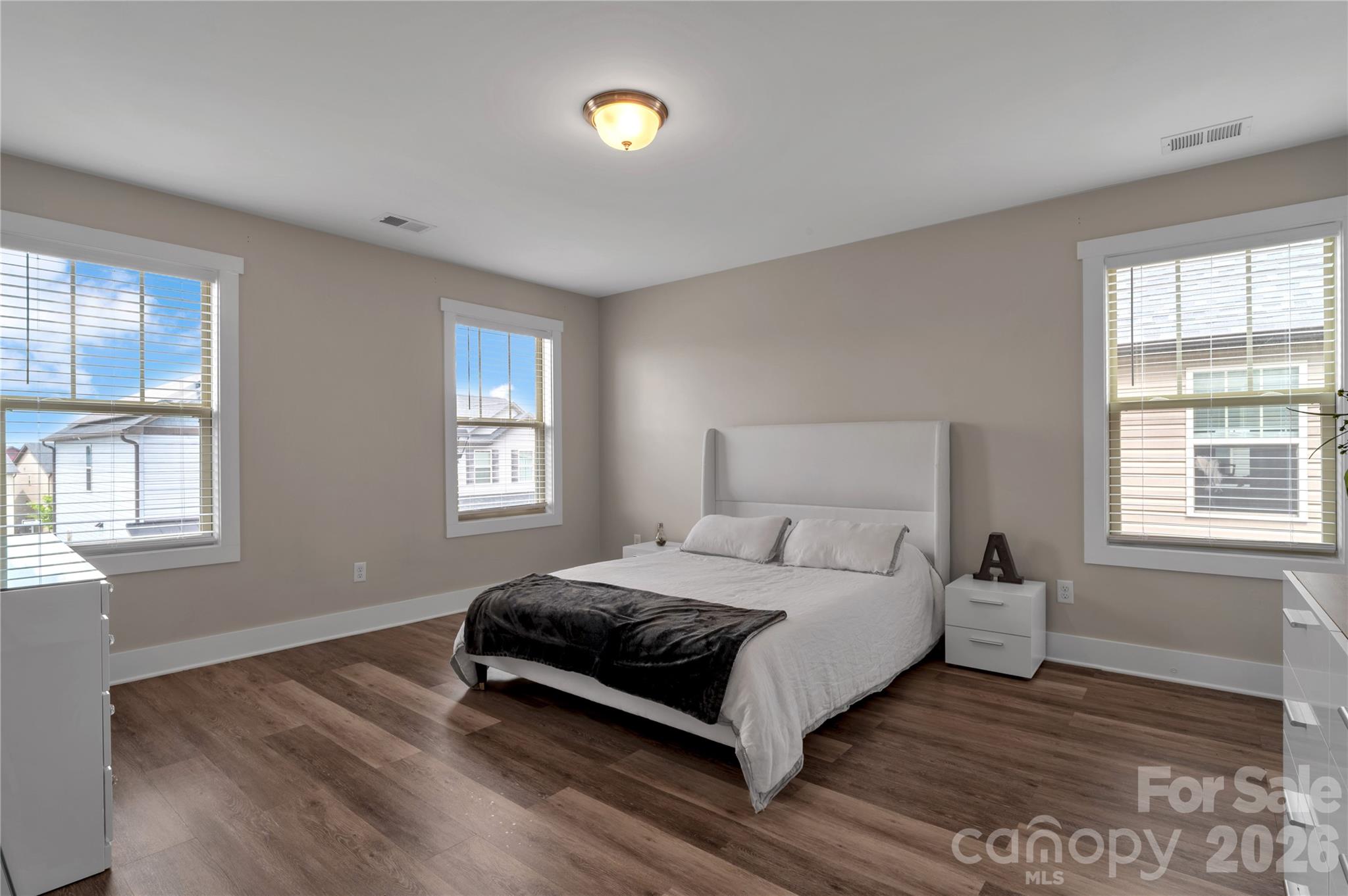 27 Mann Lane Fletcher, NC 28732 - Photo 17 of 25 a bedroom with a bed and a window