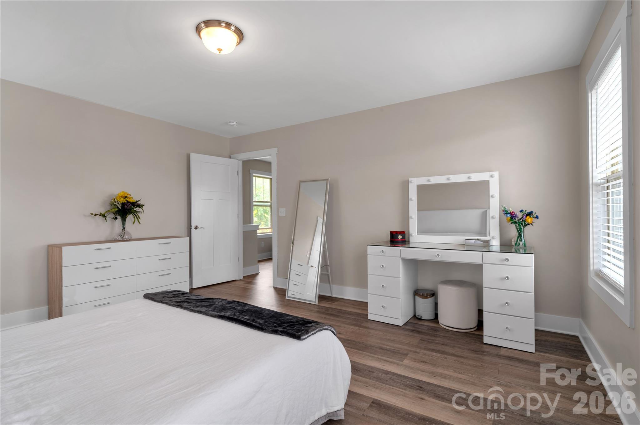 27 Mann Lane Fletcher, NC 28732 - Photo 18 of 25 a bedroom with a bed and window