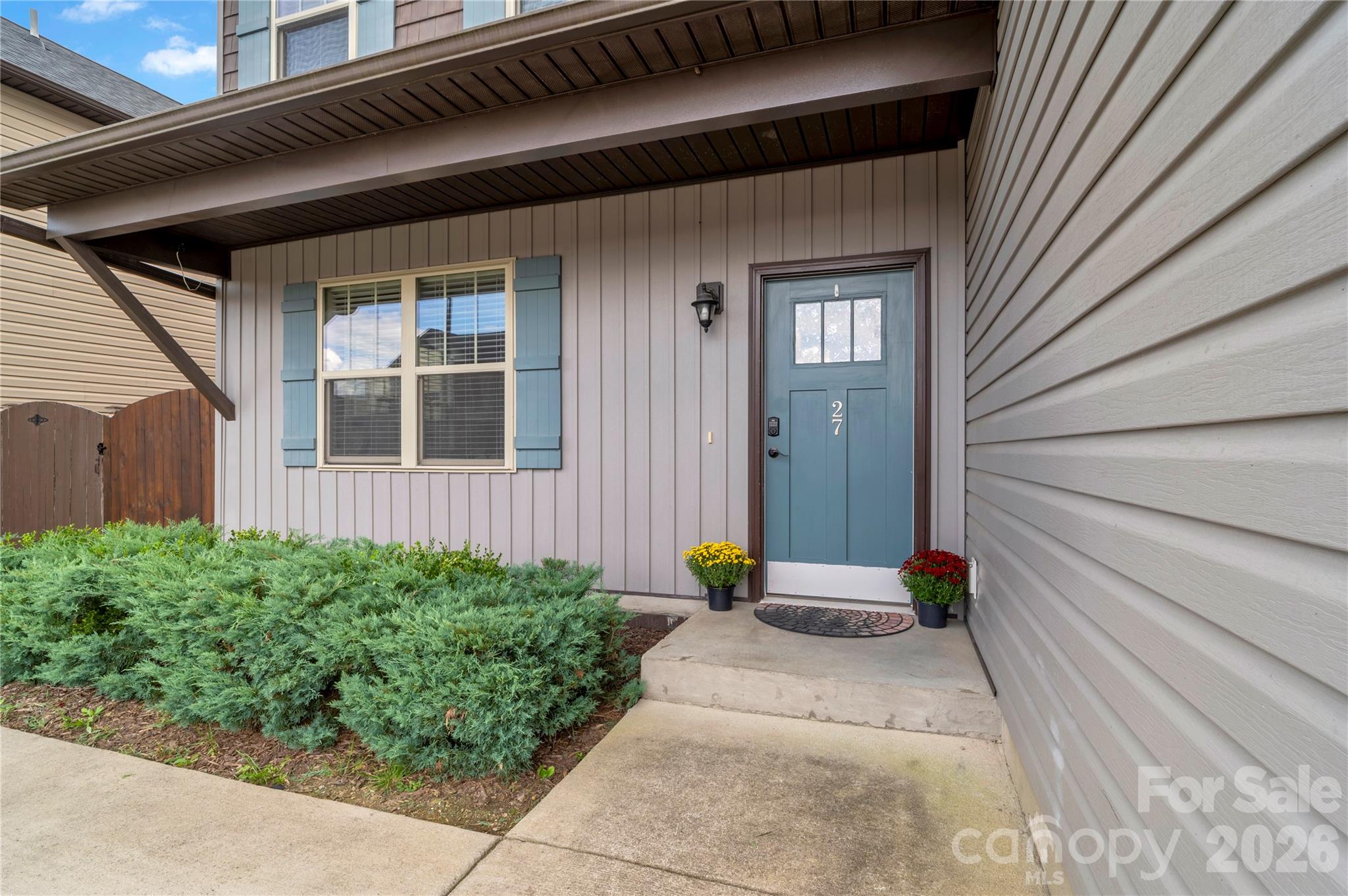 27 Mann Lane Fletcher, NC 28732 - Photo 22 of 25 a view of the entrance door of the house