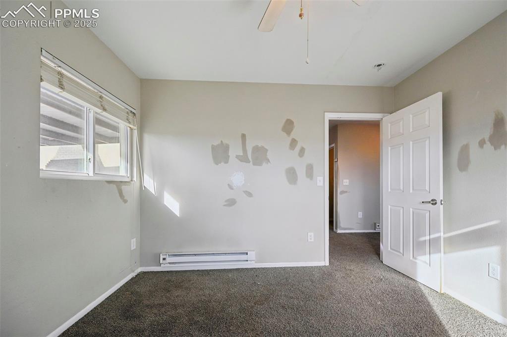 7865 Wilson Road Fountain, CO 80817 - Photo 36 of 46 a view of an empty room with window