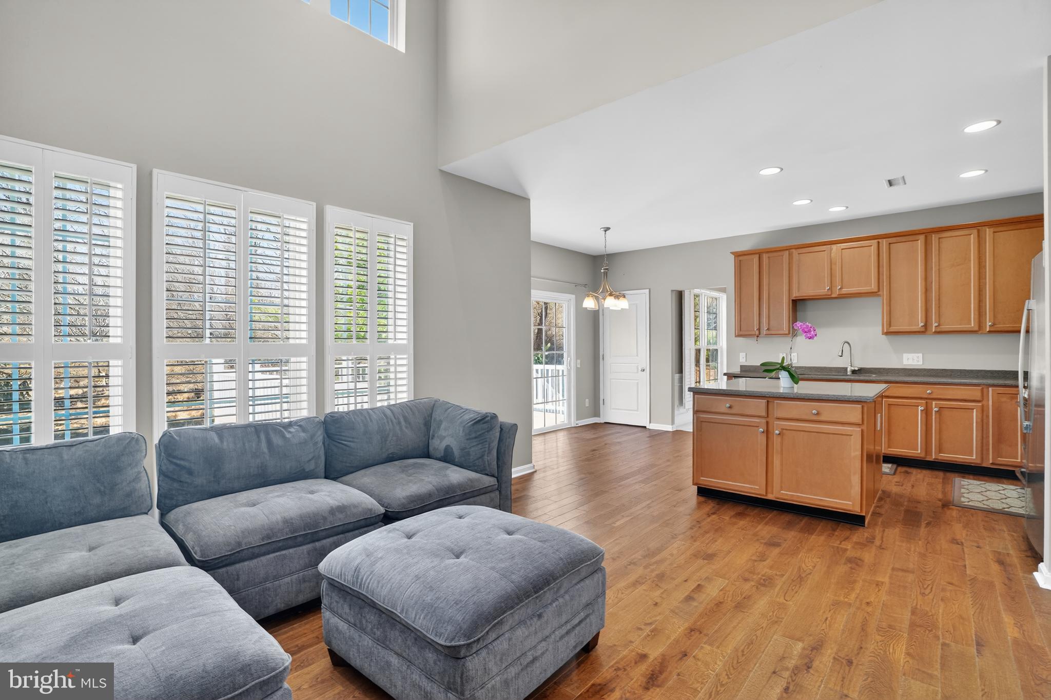 694 Churchill Road Chester Springs, PA 19425 - Photo 17 of 49 a living room with furniture and a large window