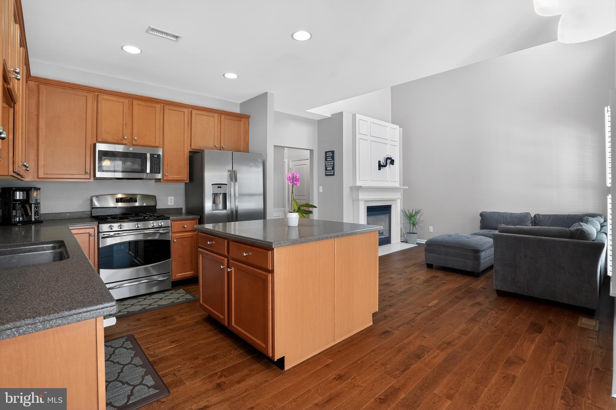 694 Churchill Road Chester Springs, PA 19425 - Photo 21 of 49 a kitchen with stainless steel appliances a stove a sink a refrigerator a microwave oven and a refrigerator