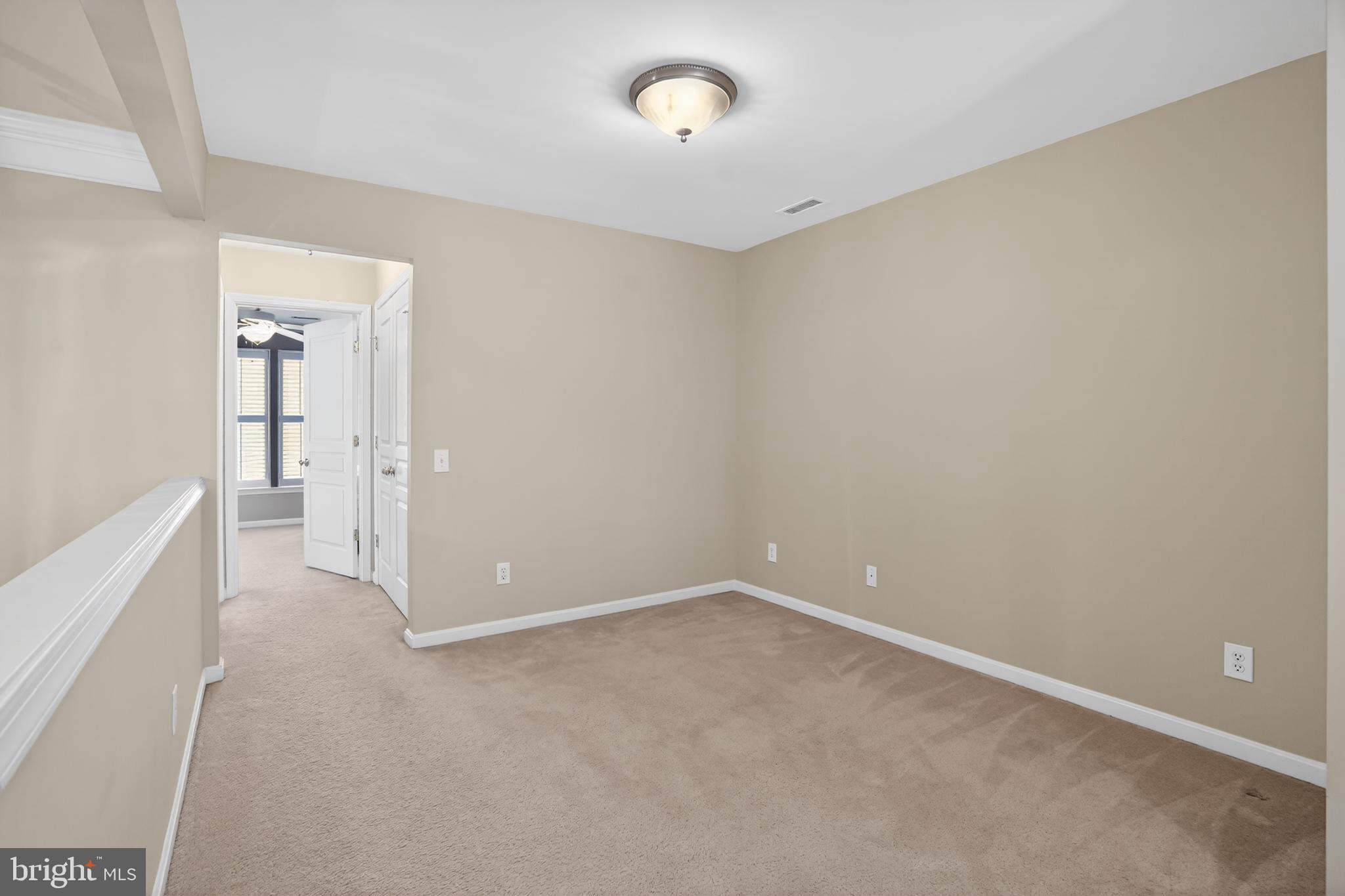 694 Churchill Road Chester Springs, PA 19425 - Photo 27 of 49 a view of an empty room with a window