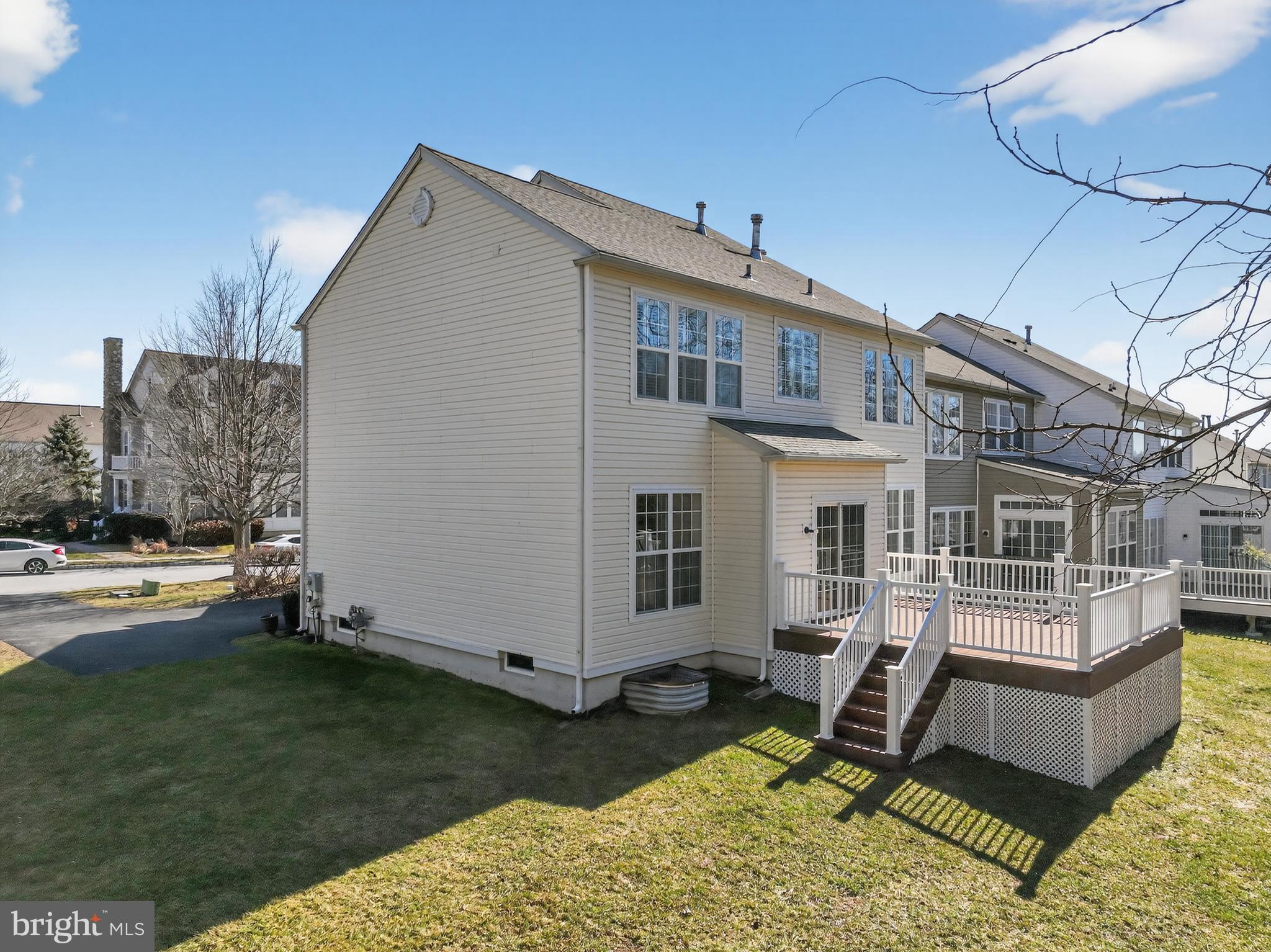 694 Churchill Road Chester Springs, PA 19425 - Photo 7 of 49 a view of a house with backyard and sitting area