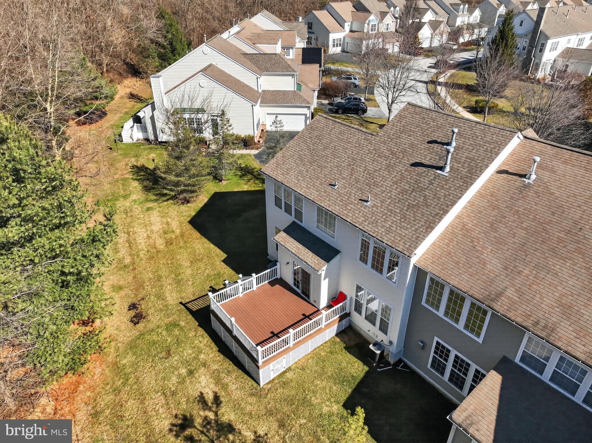694 Churchill Road Chester Springs, PA 19425 - Photo 8 of 49 a aerial view of a house with swimming pool