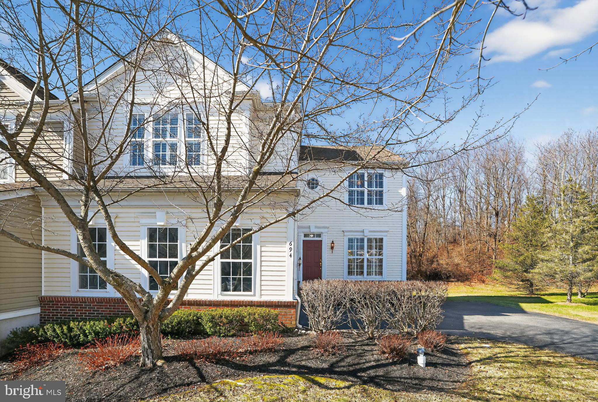 694 Churchill Road Chester Springs, PA 19425 - Photo 9 of 49 a front view of a house with garden