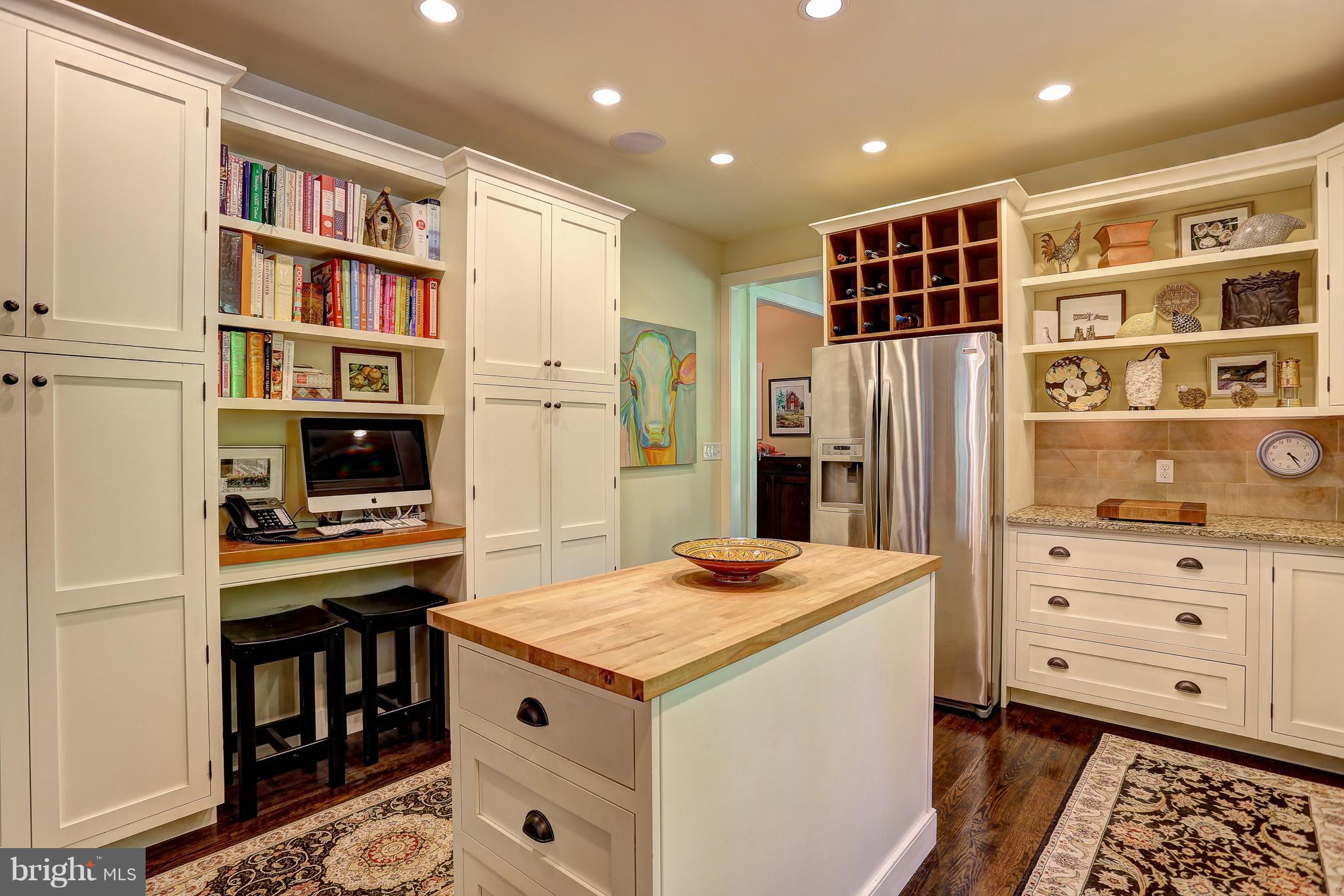 16526 Dubbs Road Sparks, MD 21152 - Photo 12 of 29 a kitchen that has a stove and a refrigerator