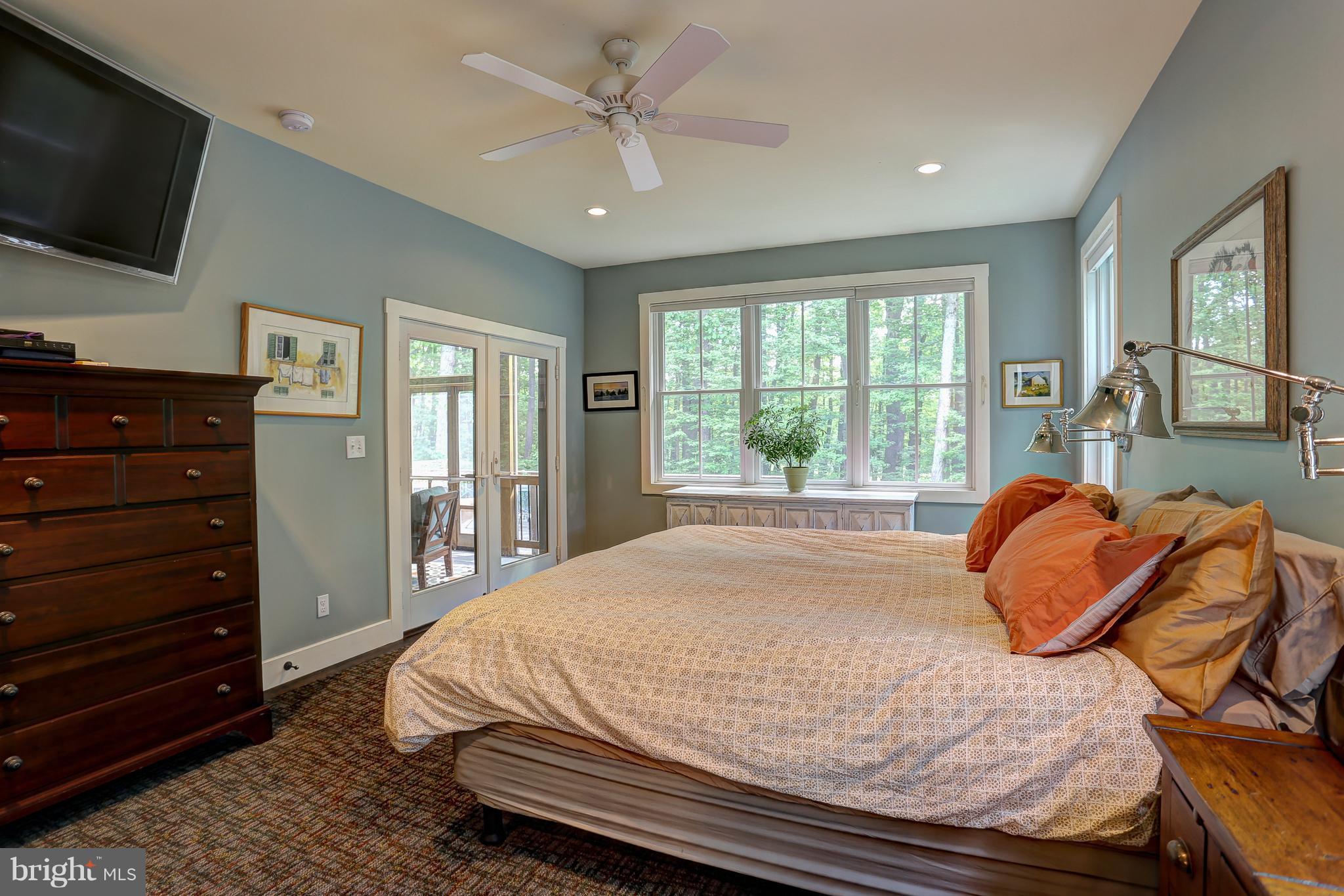 16526 Dubbs Road Sparks, MD 21152 - Photo 16 of 29 a bed sitting in a spacious bedroom next to a window