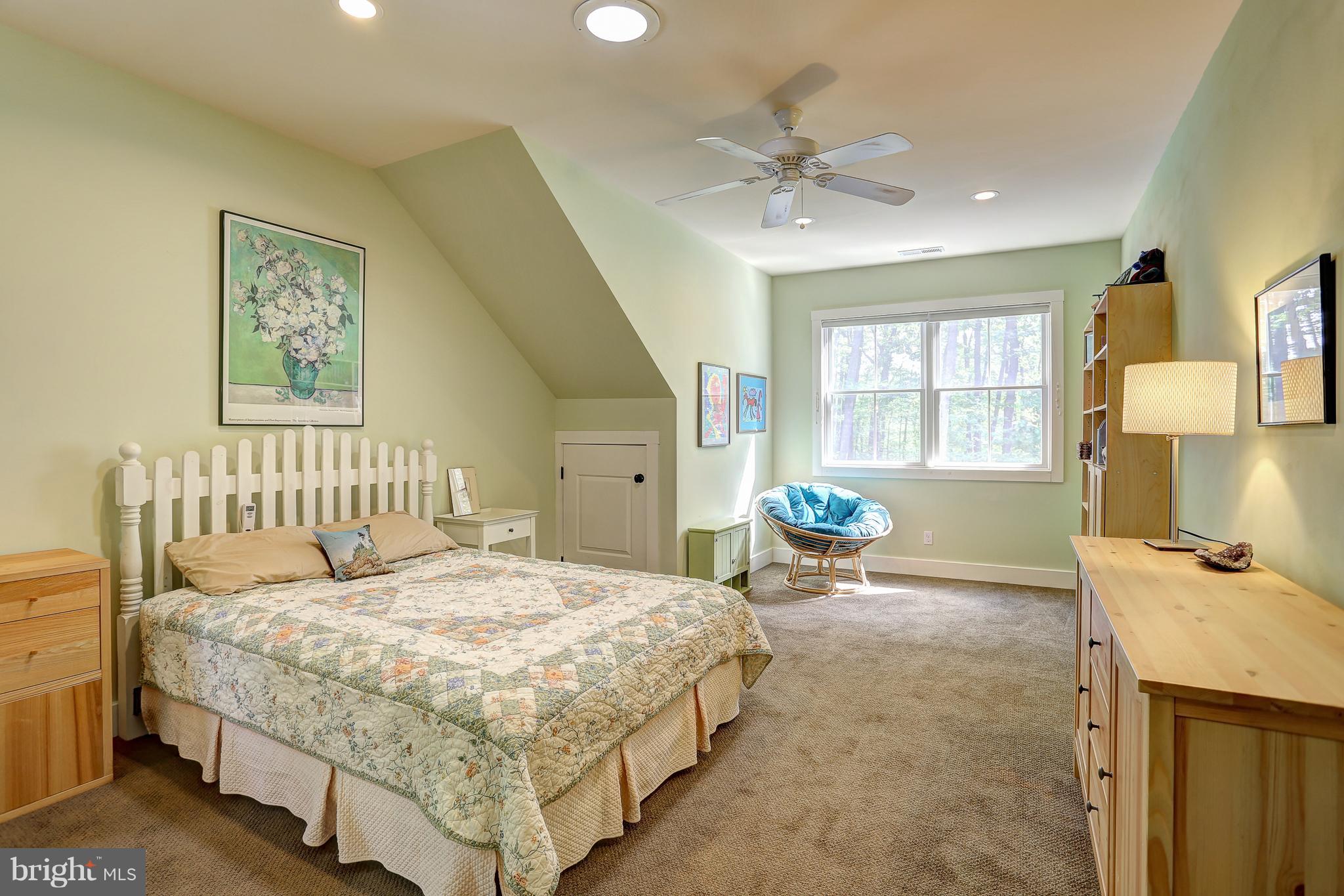 16526 Dubbs Road Sparks, MD 21152 - Photo 19 of 29 a bedroom with a bed and a window