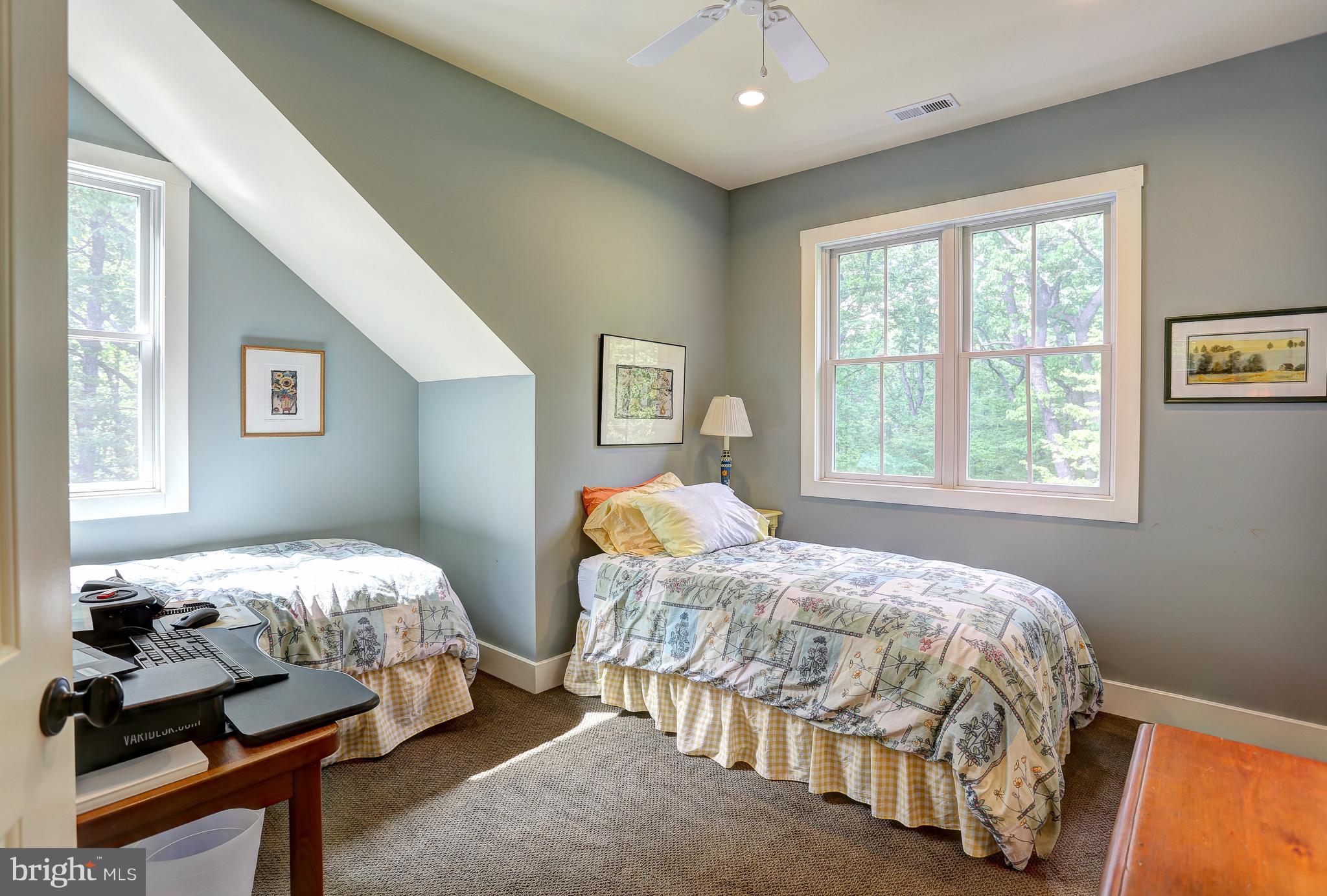 16526 Dubbs Road Sparks, MD 21152 - Photo 20 of 29 a bedroom with two beds and a window