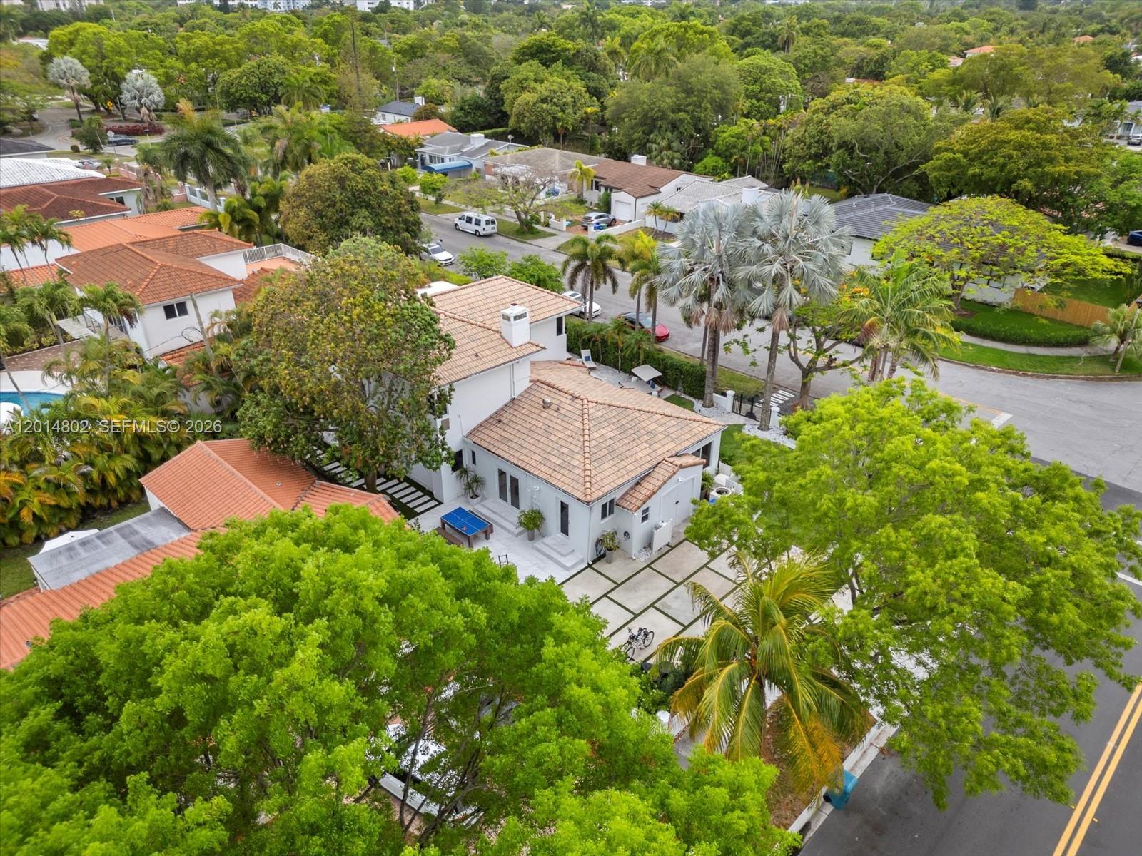 825 Southwest 23rd Road, Unit 1 Miami, FL 33129 - Photo 25 of 92 an aerial view of residential house with outdoor space and trees all around