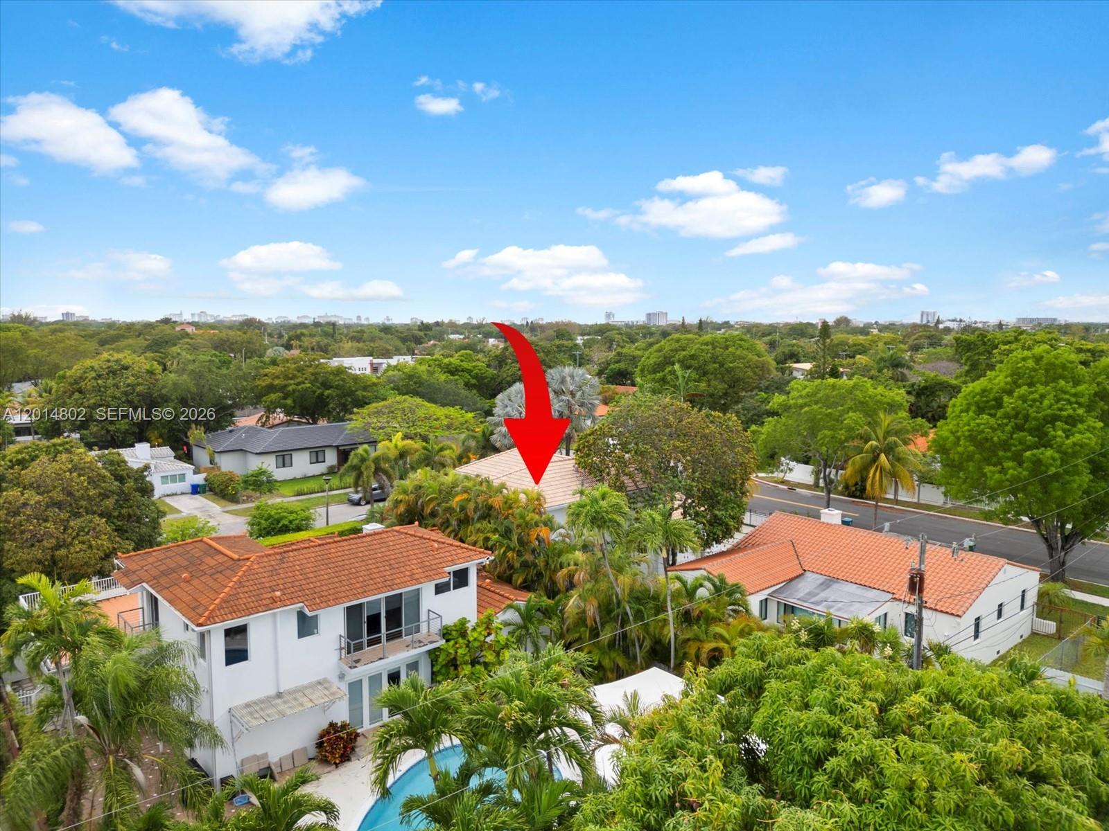 825 Southwest 23rd Road, Unit 1 Miami, FL 33129 - Photo 29 of 92 an aerial view of residential houses with outdoor space and trees