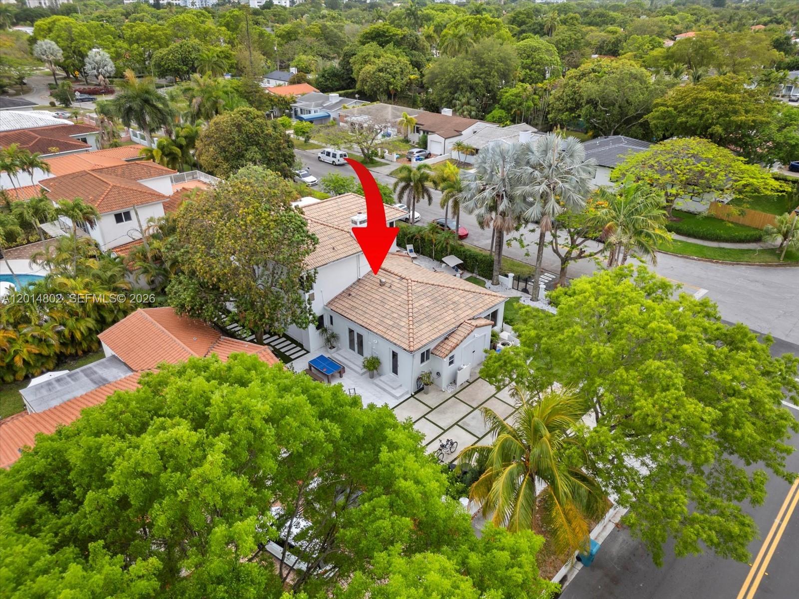 825 Southwest 23rd Road, Unit 1 Miami, FL 33129 - Photo 30 of 92 an aerial view of residential house with outdoor space and trees all around