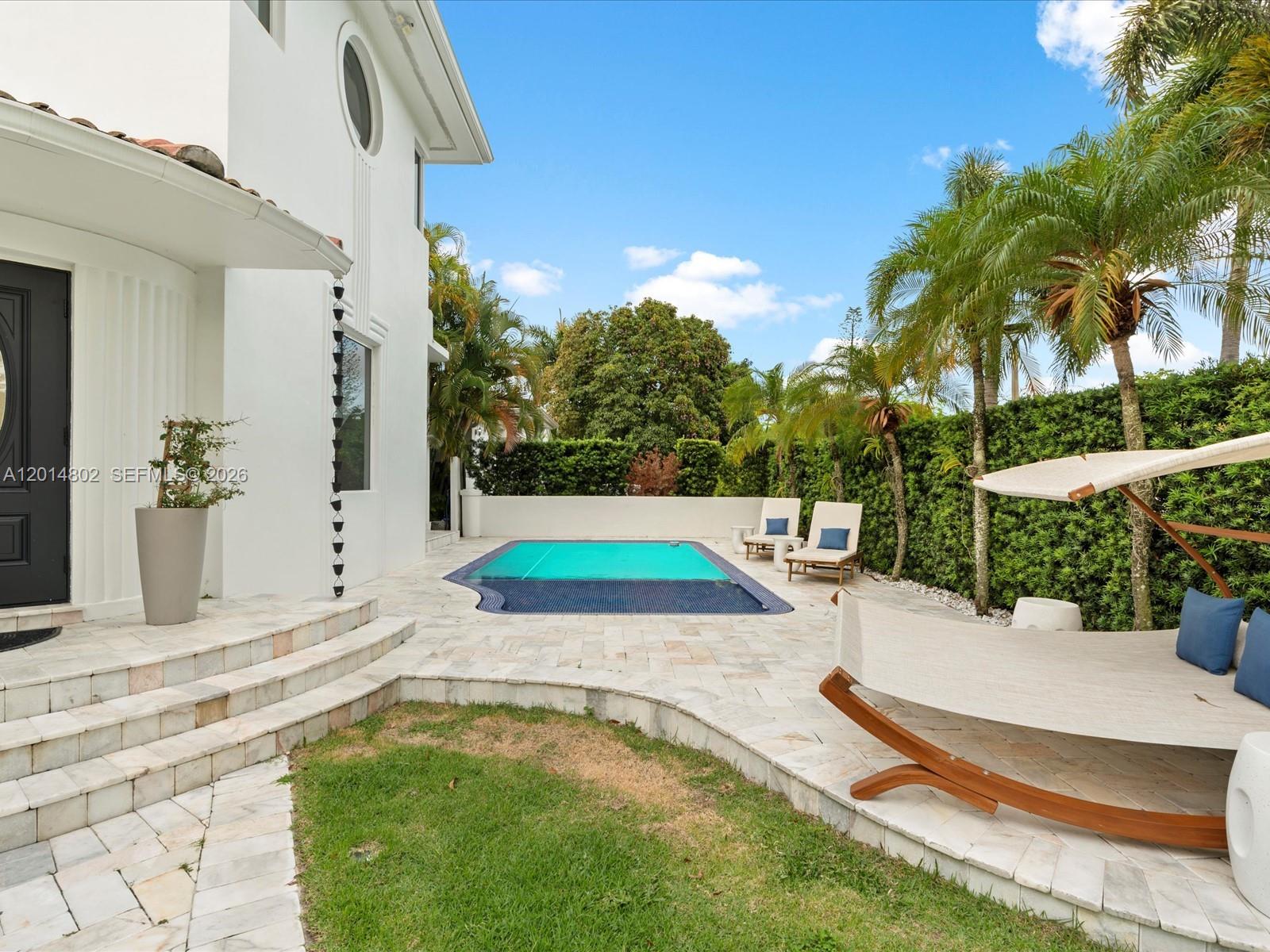 825 Southwest 23rd Road, Unit 1 Miami, FL 33129 - Photo 4 of 92 a view of a backyard with swimming pool