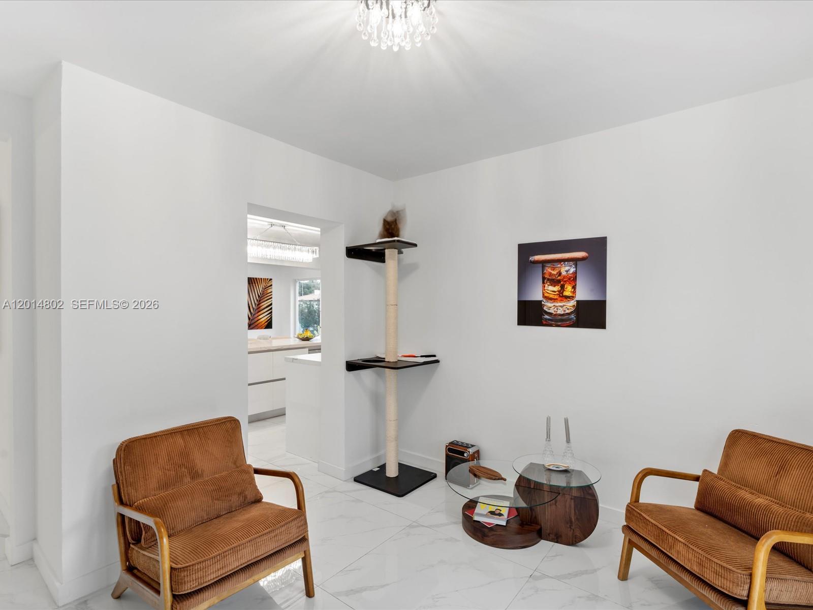825 Southwest 23rd Road, Unit 1 Miami, FL 33129 - Photo 54 of 92 a room with furniture and a chair