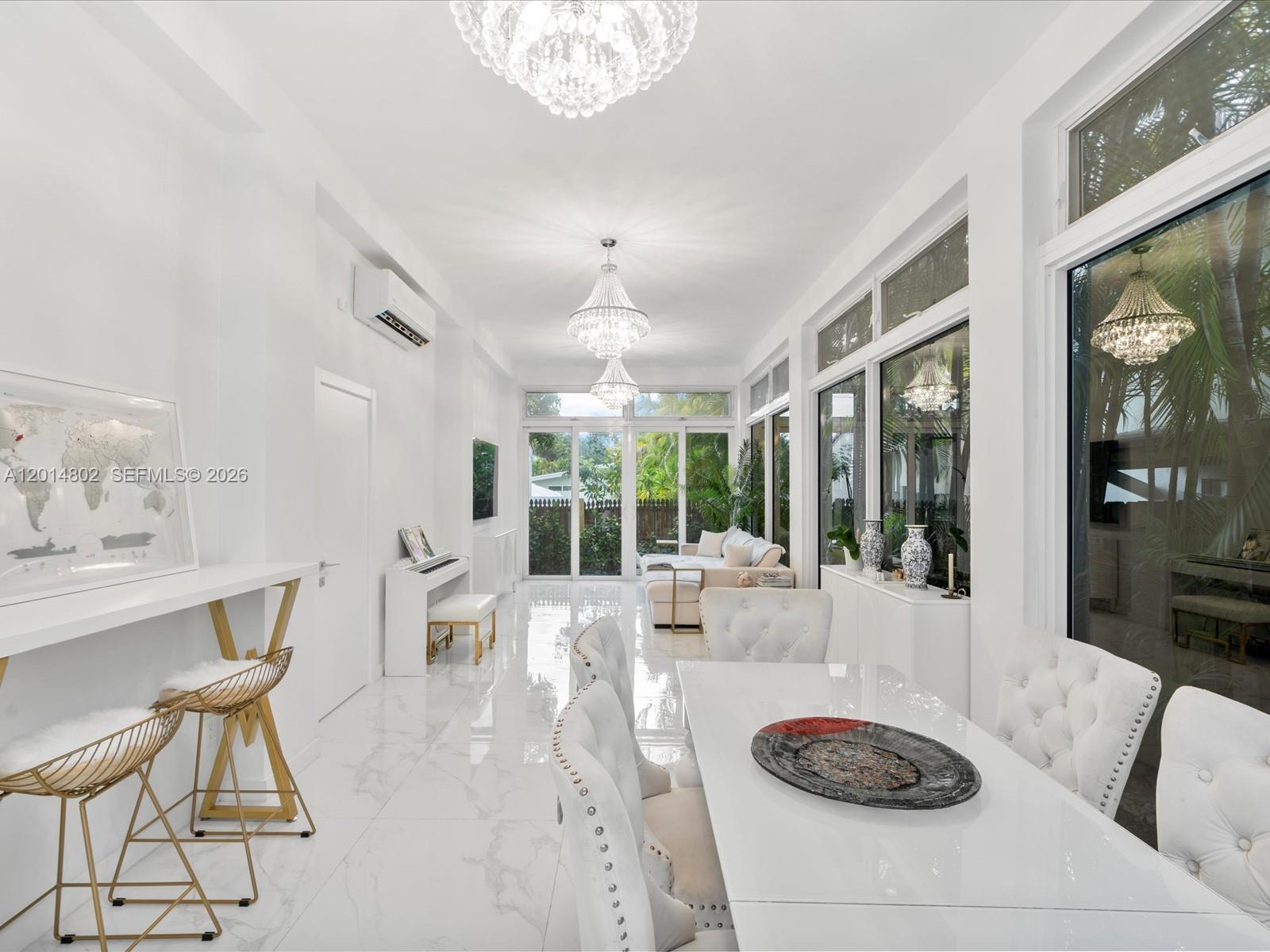 825 Southwest 23rd Road, Unit 1 Miami, FL 33129 - Photo 69 of 92 a living room with furniture and a large window