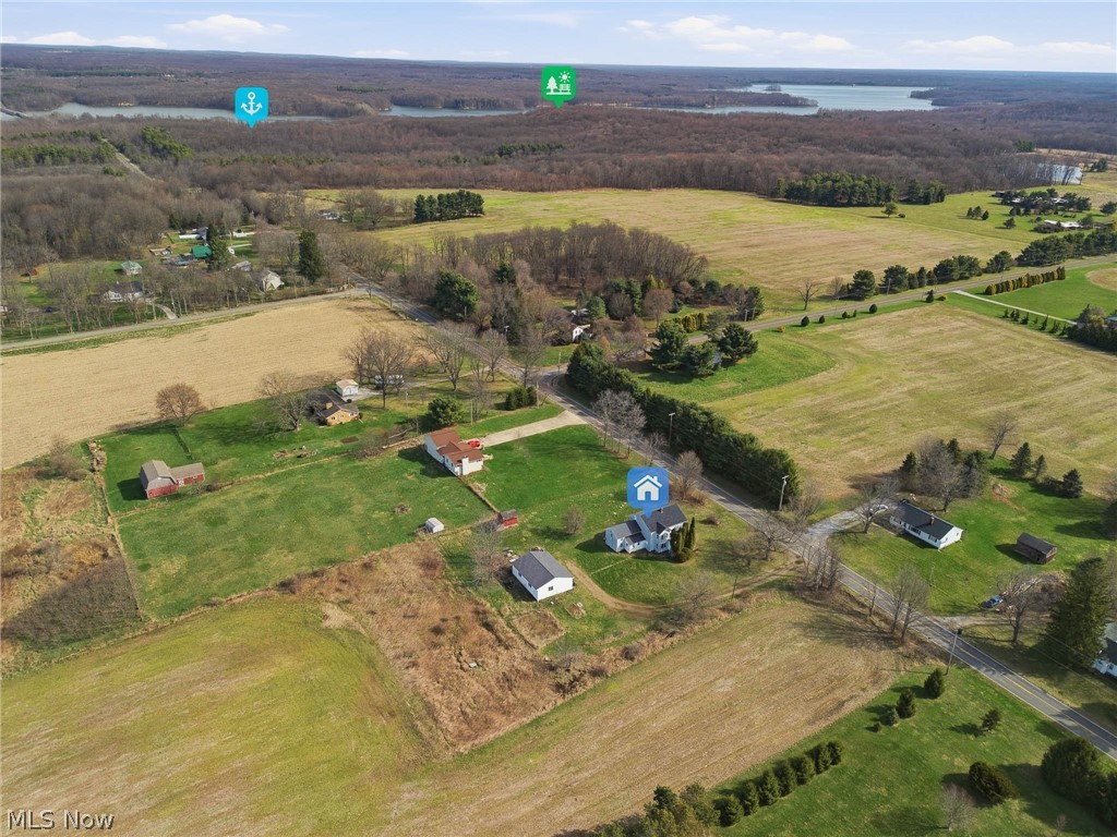 4677 Rock Spring Road Ravenna, OH 44266 - Photo 2 of 35 Aerial view of property and surrounding area featuring a nearby body of water and rural landscape