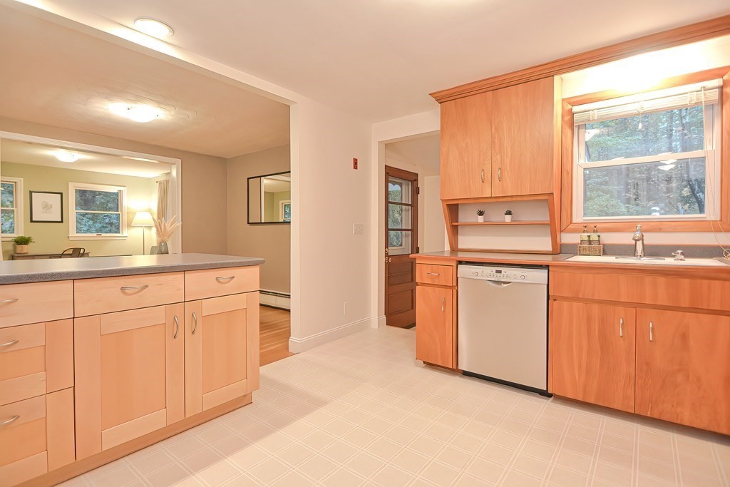 3 Smart Road Acton, MA 01720 - Photo 11 of 23 a kitchen with white cabinets and white appliances