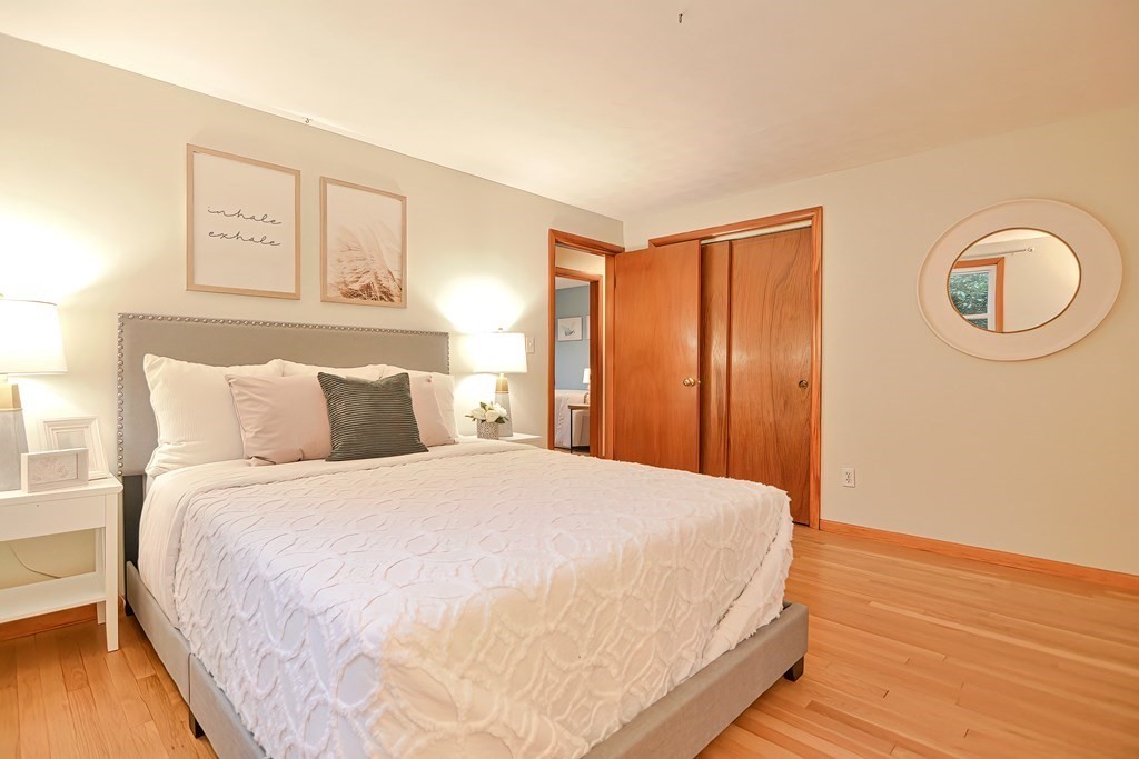3 Smart Road Acton, MA 01720 - Photo 14 of 23 a large bed in a bedroom next to a window