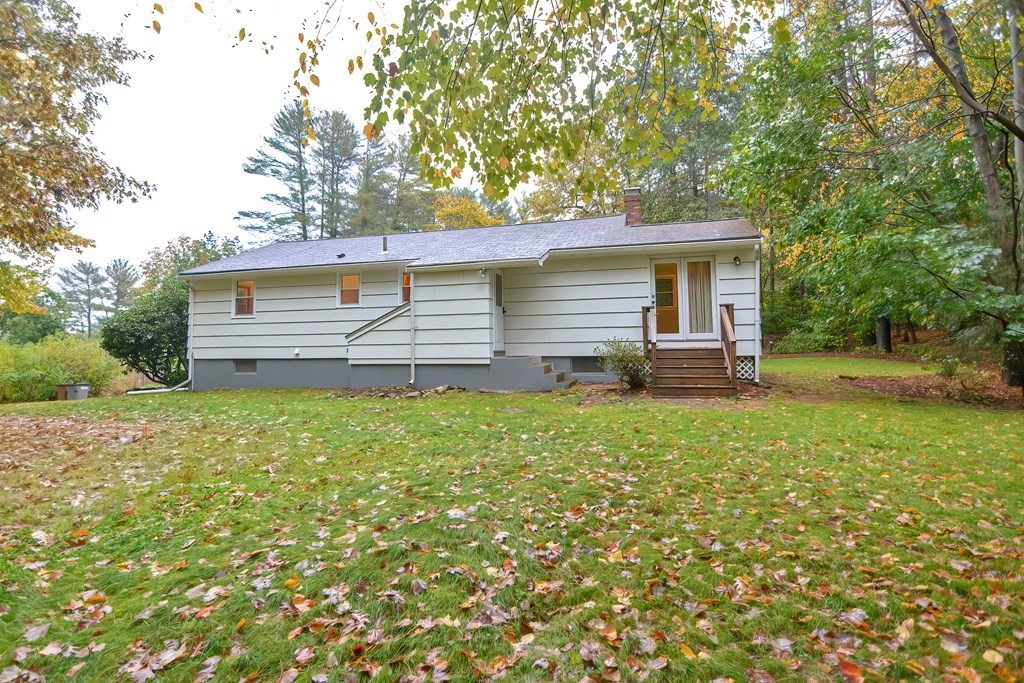 3 Smart Road Acton, MA 01720 - Photo 22 of 23 a view of a house with a backyard