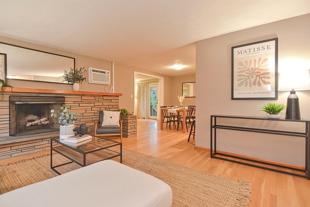 3 Smart Road Acton, MA 01720 - Photo 5 of 23 a living room with furniture and a fireplace