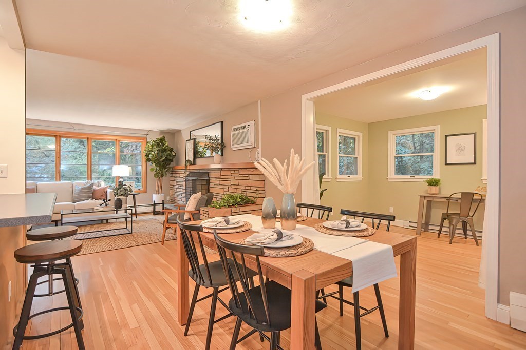 3 Smart Road Acton, MA 01720 - Photo 8 of 23 a view of a dining room with furniture and wooden floor