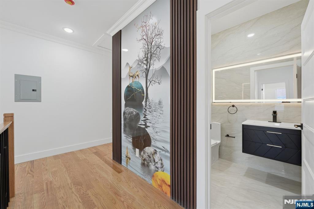 275 Longview Road Union, NJ 07083 - Photo 31 of 43 a spacious bathroom with a glass shower door and a sink