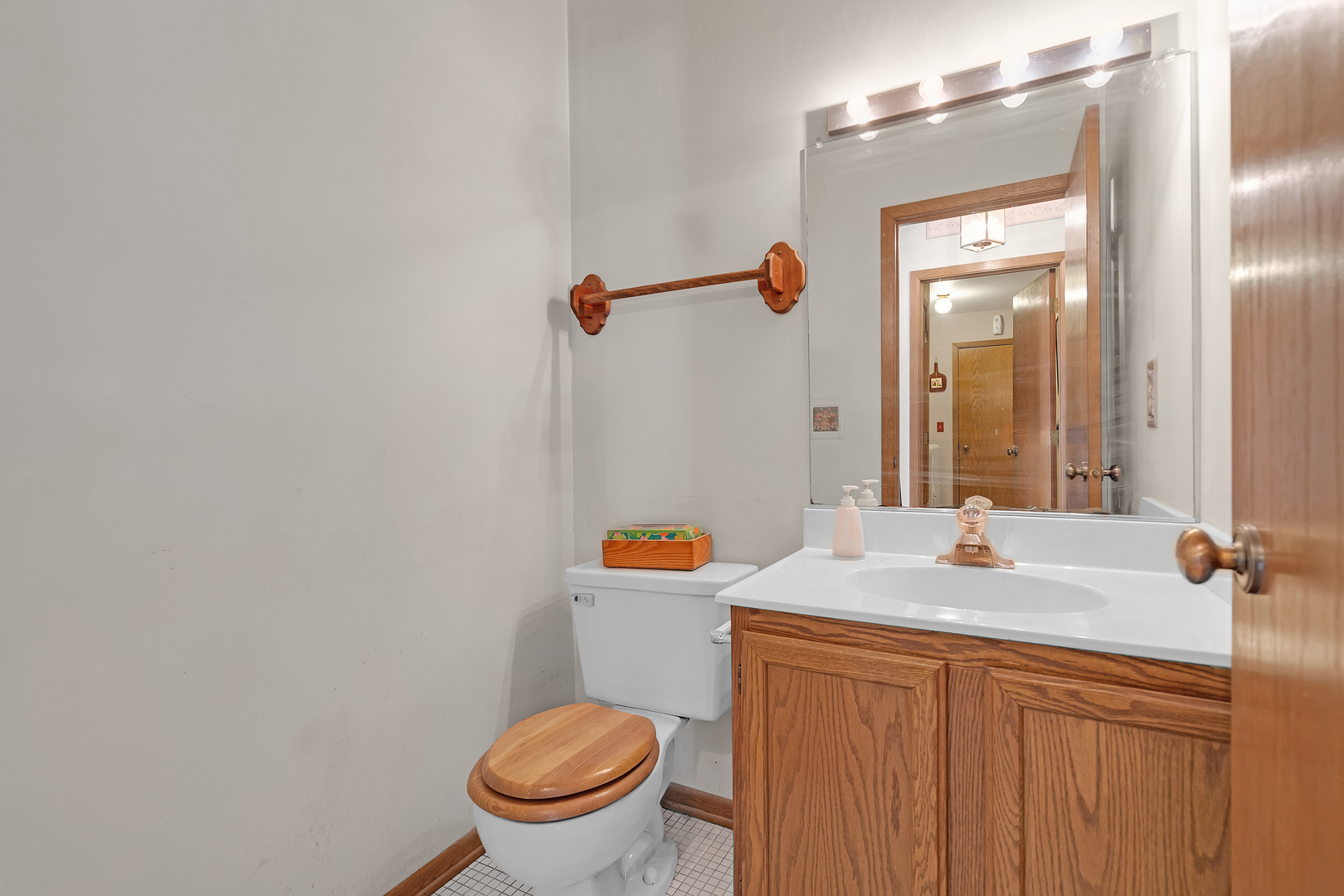 121 South Raddant Road Batavia, IL 60510 - Photo 12 of 22 a bathroom with a sink and toilet