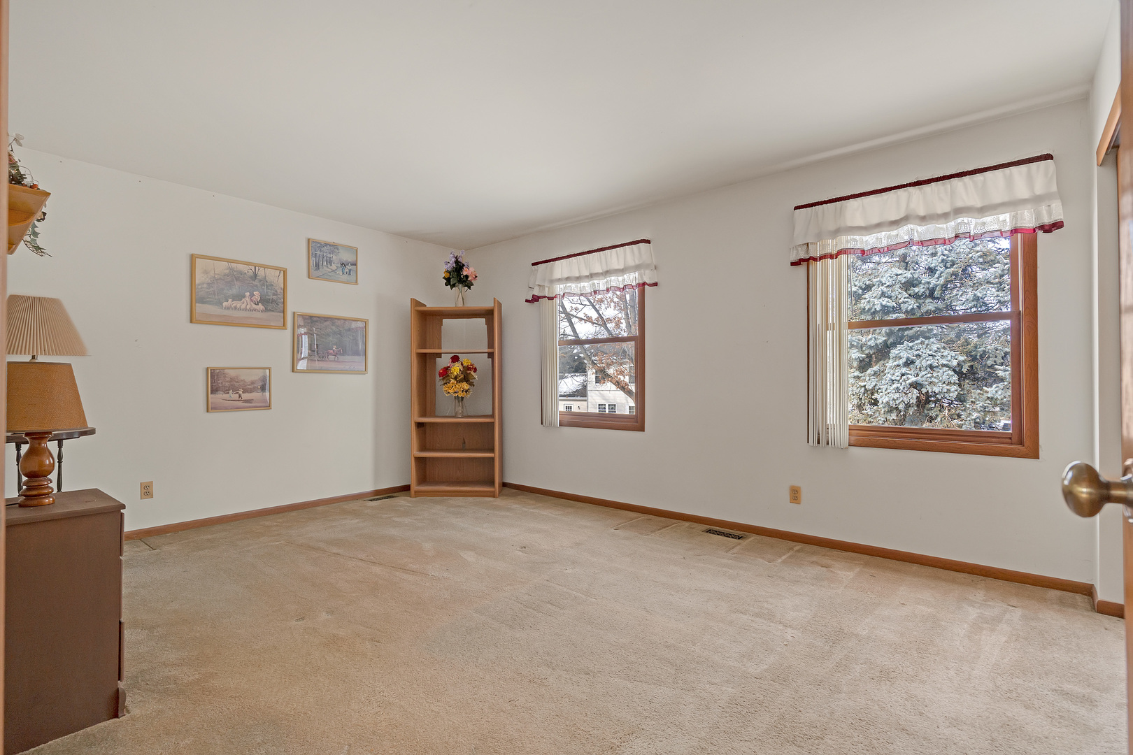 121 South Raddant Road Batavia, IL 60510 - Photo 16 of 22 a view of an empty room with window and workspace