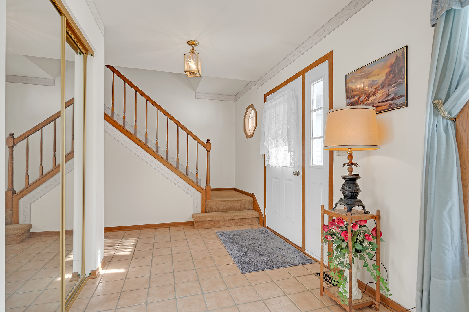 121 South Raddant Road Batavia, IL 60510 - Photo 3 of 22 a view of entryway and hall with a front door