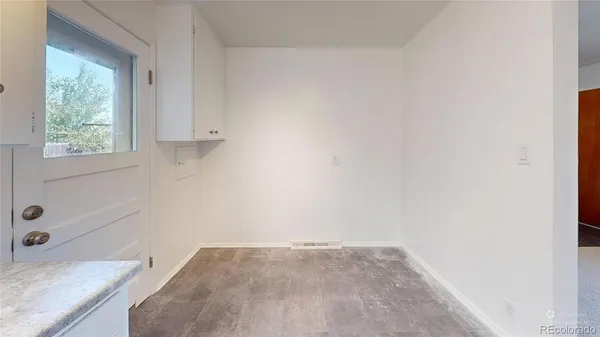 a view of a kitchen cabinets a sink and dishwasher
