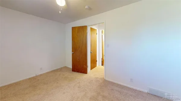 an empty room with window