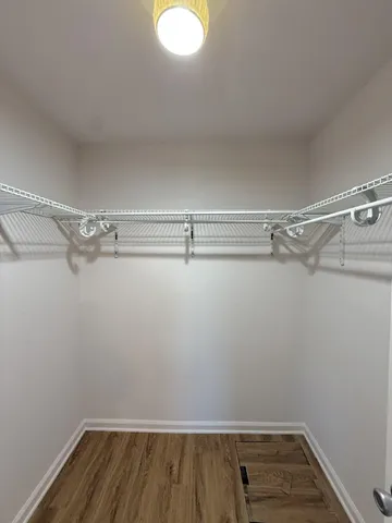 a view of a room with racks on the wall