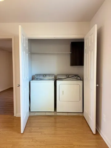a utility room with washer and dryer
