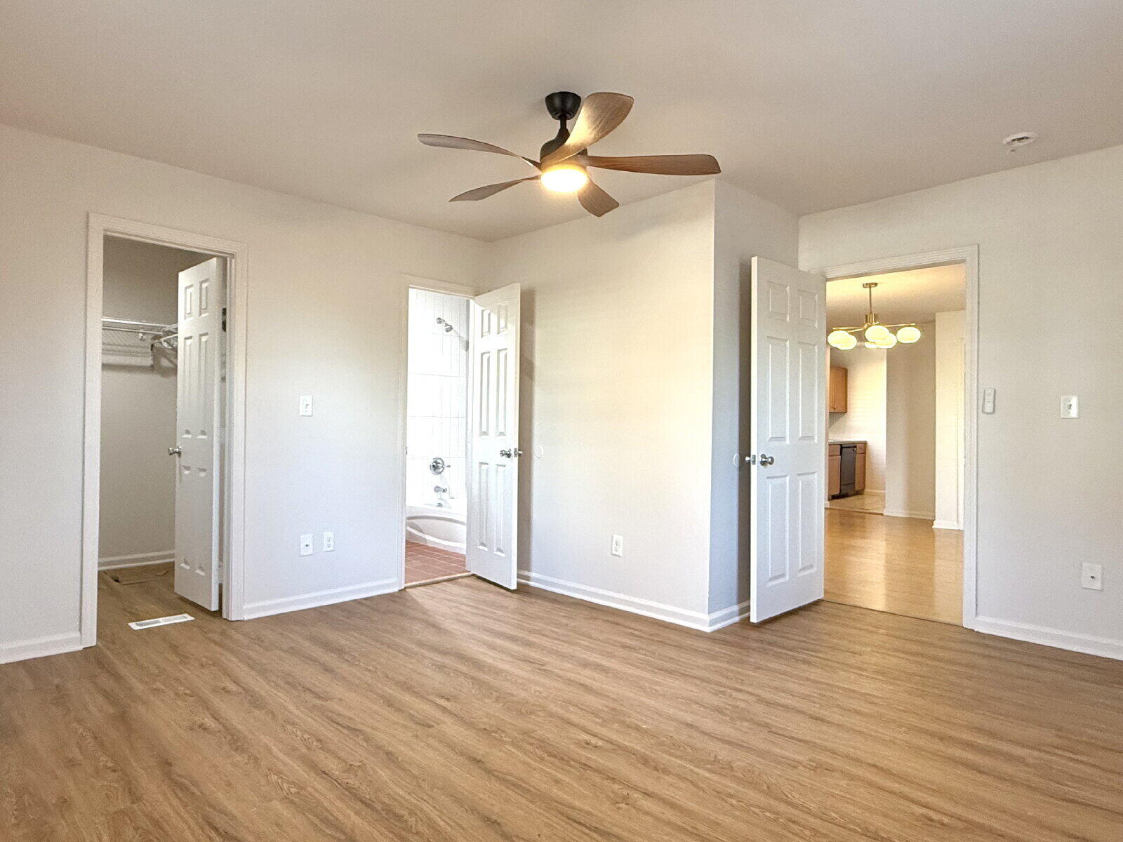3118 37th Street, Unit B Lubbock, TX 79413 - Photo 10 of 21 a view of empty room with wooden floor