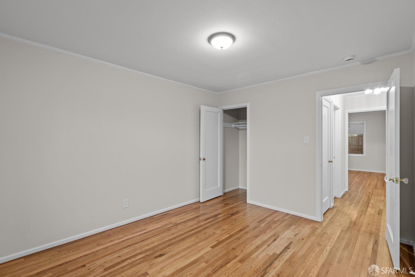 193 Hillside Boulevard Daly City, CA 94014 - Photo 12 of 20 a view of hallway with wooden floor